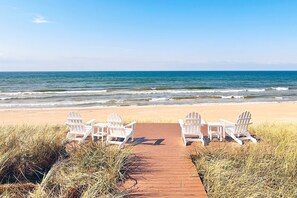 On the beach, sun-loungers, beach towels