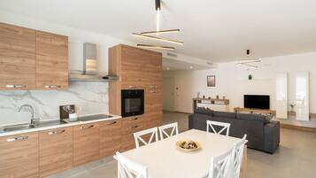 Standard Apartment | Private kitchen | Stovetop, espresso maker