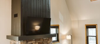 Cabin in the woods with hot tub and lake views. Pets welcome! Close to Nordic.