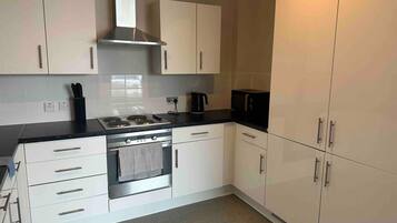 Apartment | Private kitchen | Fridge, microwave, oven, stovetop