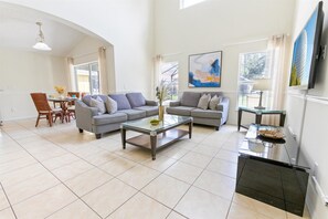 House, Multiple Beds, Pool Access, Pool View (EIB2630) | Living area - 2630 Emerald Island Blvd (Kissimmee)