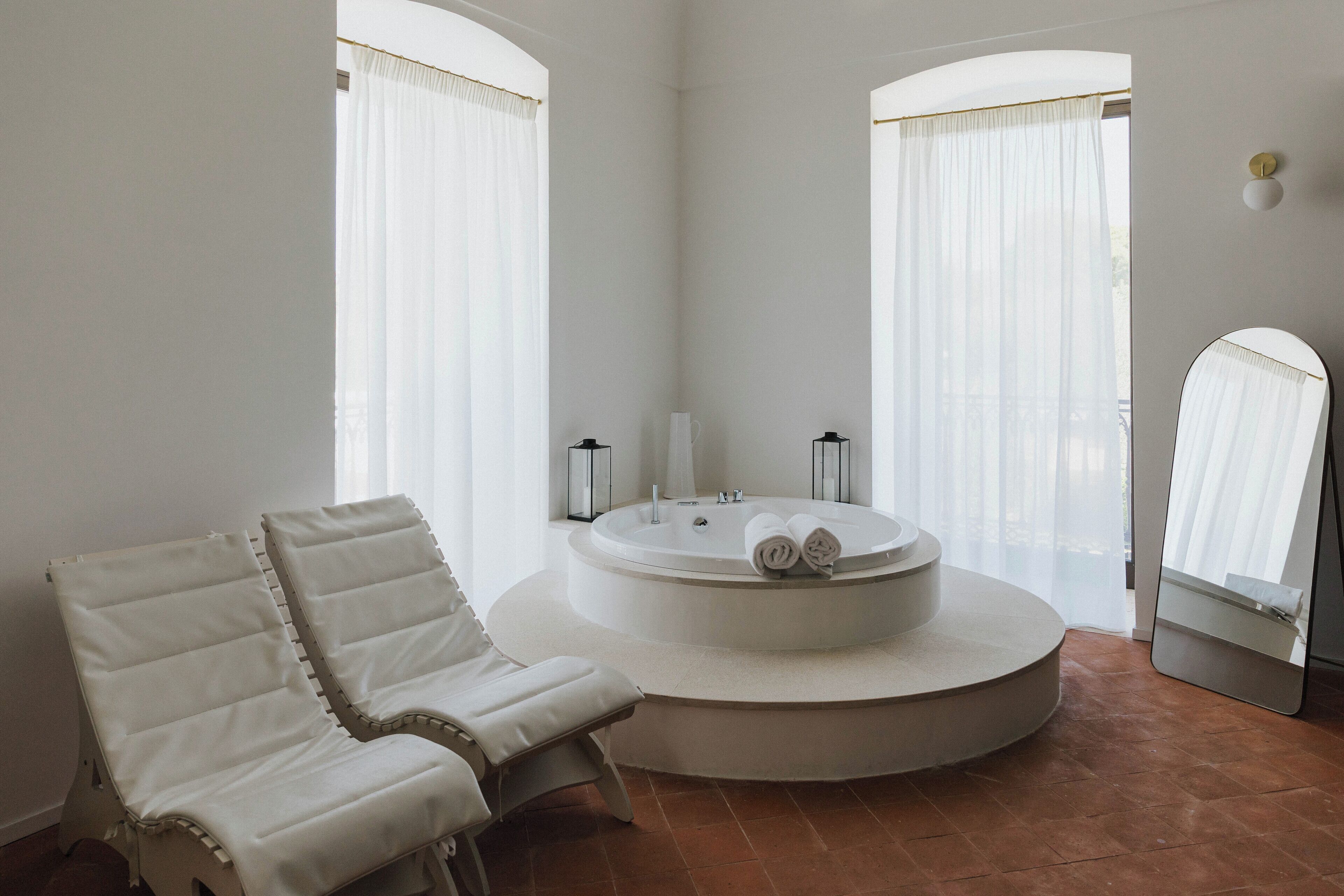 Suite, 1 King Bed, Hot Tub, Sea View | Bathroom | Separate tub and shower, deep soaking tub, rainfall showerhead