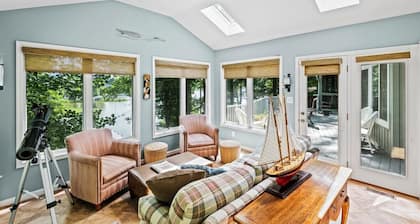 Waterfront w/ room to gather & beautiful lake views! Lakeside firepit w/ swings