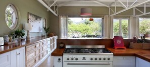 Oven, dishwasher, cookware/dishes/utensils, dining tables