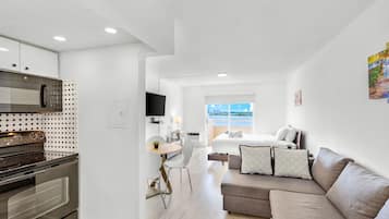 Departamento | 1 habitación, tabla de planchar con plancha, wifi gratis y ropa de cama