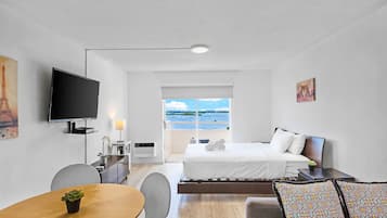 Departamento | 1 habitación, tabla de planchar con plancha, wifi gratis y ropa de cama