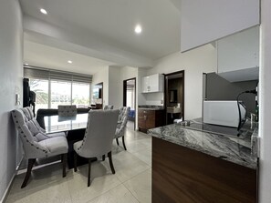 Deluxe Apartment, 2 Bedrooms, Balcony, Lake View | Private kitchen | Full-size fridge, microwave, blender, cleaning supplies - Pacifika Marina Mazatlan by Partnerhost (Mazatlán)