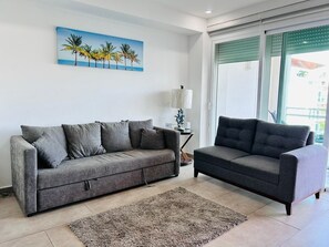 Elite Apartment, 2 Bedrooms, Balcony, Lake View | Living area | 40-inch flat-screen TV with digital channels, streaming services - Pacifika Marina Mazatlan by Partnerhost (Mazatlán)