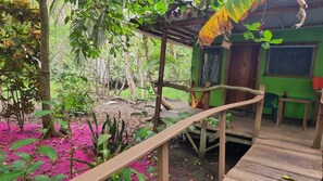 Step out onto the deck and enjoy the serene surroundings of this eco-friendly retreat.