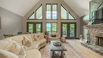 Smart TV, fireplace, books, printers