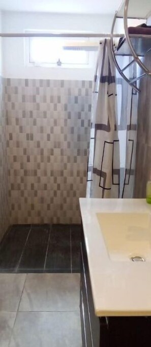 Shower, towels, soap, shampoo