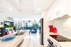 Fridge, microwave, oven, stovetop - Seaside Glory: Ocean-City View ~ Pool ~ Workspace (Darwin City)