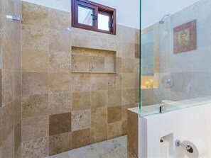 Shower, hair dryer, towels, shampoo