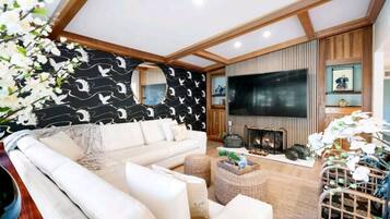 Smart TV, fireplace, video games, foosball