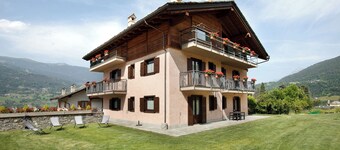 Casa de vacaciones 'Le Cré Appartamento 3' con vistas a la montaña, jardín compartido y Wi-Fi