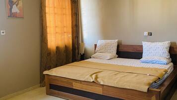 Down duvets, memory-foam beds, desk, laptop workspace