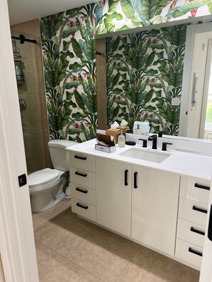 Shower, hair dryer, towels, soap