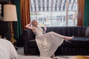 Presidential Studio Suite, 1 King Bed, Accessible, Pool View | Living area | 60-inch LED TV with digital channels, MP3 dock, streaming services - The Velvet Rope (Palm Springs)