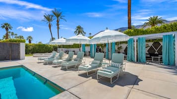 Outdoor pool, free cabanas, pool umbrellas