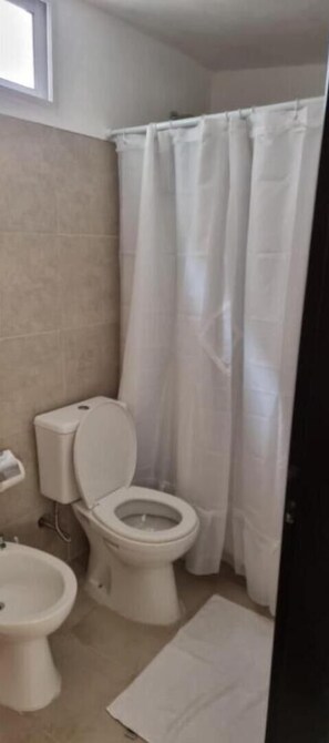 Hair dryer, towels, soap, toilet paper