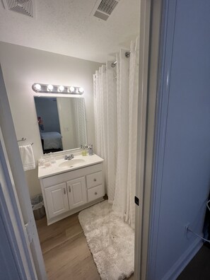 Hair dryer, towels, soap, shampoo