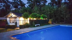 A swimming pool with a house in the background. - 3 bedroom awesome home in Spier (Spier)