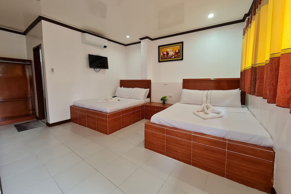 Family Room | 1 bedroom, iron/ironing board, free WiFi, bed sheets