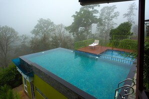 Outdoor pool - Amrezy Resort and Spa by Stride Wayanad (Vythiri)
