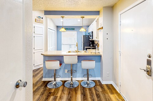 Water-view condo with heated pool, hot tub, gym, & private balcony - near beach