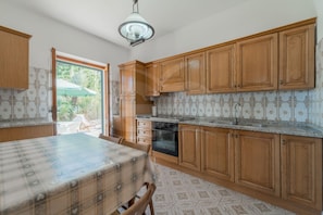 Fridge, oven, dining tables