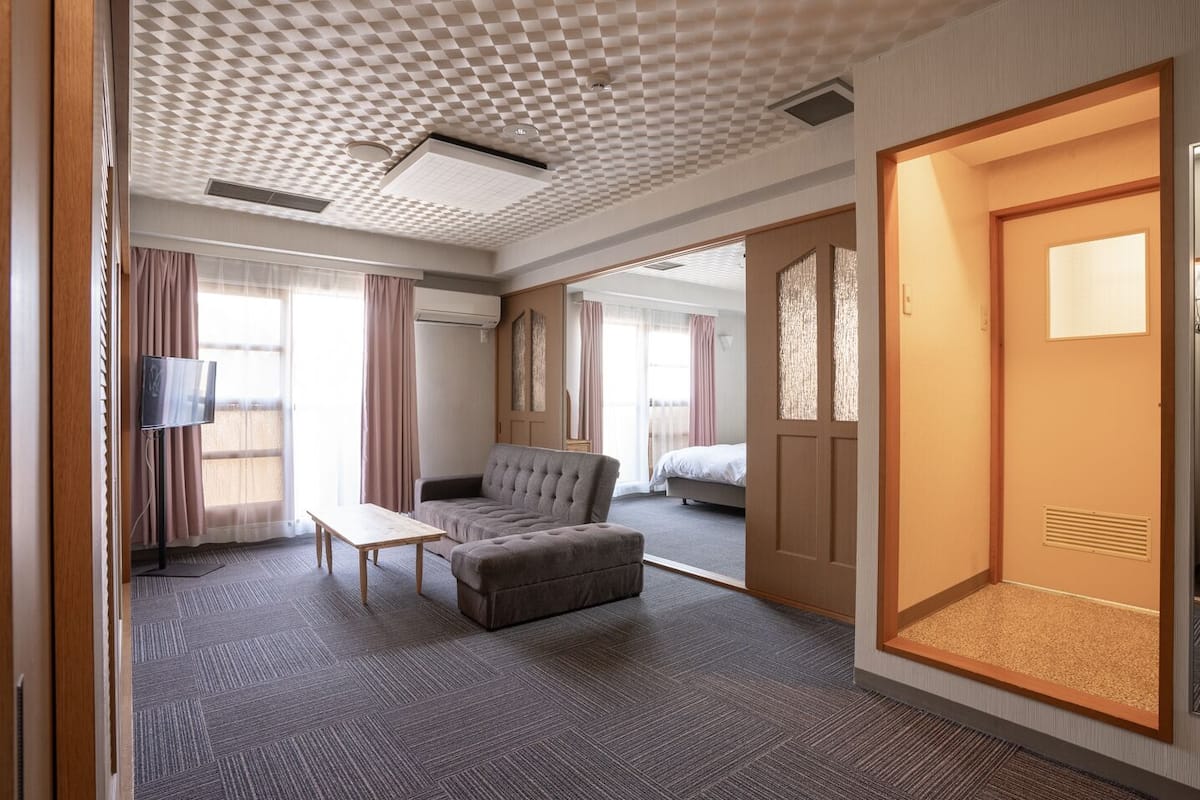 Habitación familiar, para no fumadores | Escritorio, wifi gratis y ropa de cama