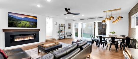 Smart TV, fireplace, books