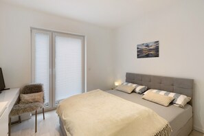 2 slaapkamers, een strijkplank/strijkijzer, gratis wifi, beddengoed