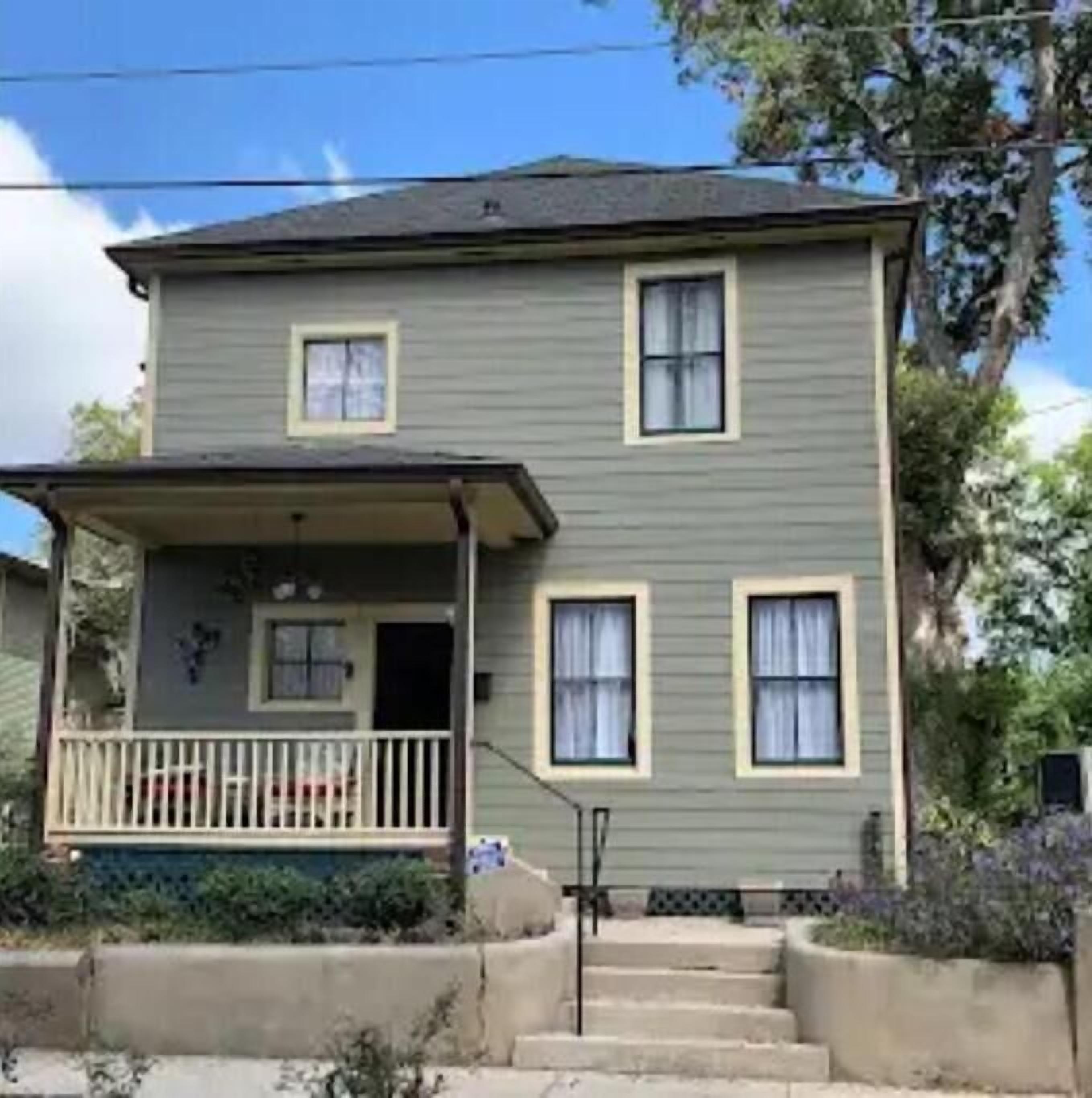 A charming cottage nestled in the historic Fostoria Neighborhood.