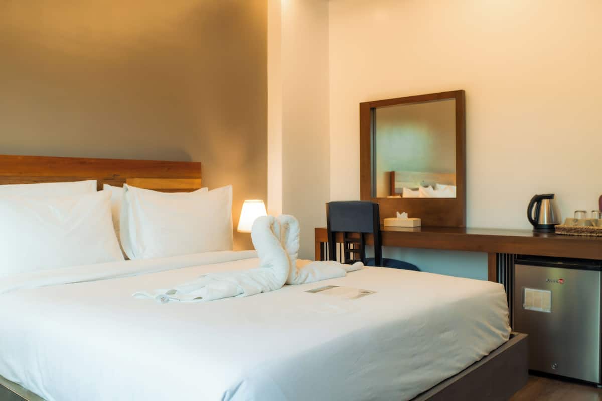 Suíte luxo | 1 quarto, roupas de cama premium, camas Tempur-Pedic, frigobar