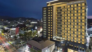 A high-rise hotel with a modern design, multiple floors, and a prominent sign. - Gloucesterhotel Jeonju  (Jeonju)