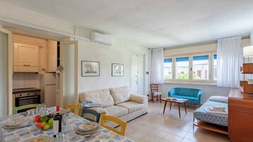 21-inch flat-screen TV with cable channels, TV