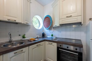Family Apartment, Multiple Bedrooms, Sea Facing (La Casina Del Pescatore On the Beach) | Private kitchen | Fridge, oven, stovetop, coffee/tea maker - La Casina Del Pescatore On the Beach (Pietrasanta)
