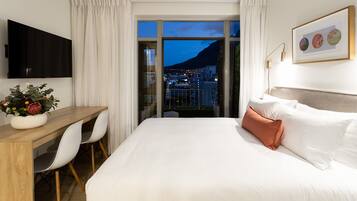 Deluxe Apartment, Balcony | Minibar, in-room safe, desk, laptop workspace