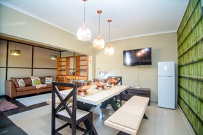 Executive Apartment | Living area | 48-inch Smart TV with digital channels - Seabo Luxury Self-Catering Apartments (Maun)