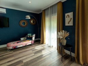 Habitación Deluxe | 1 dormitorio, edredones de plumas, minibar y caja fuerte