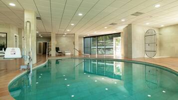 Indoor pool, open 10:00 AM to 7:00 PM, pool umbrellas, sun loungers