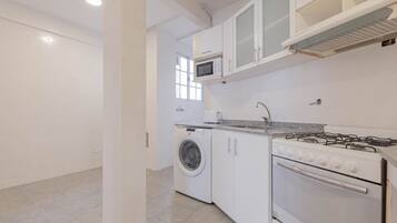 Microwave, coffee/tea maker, toaster, cookware/dishes/utensils