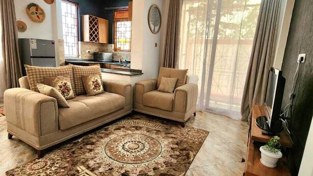 City Apartment | Living area - Enchanted Parkland Hills Stays (Kampala)