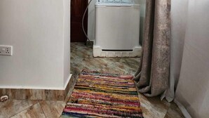 City Apartment | Laundry - Enchanted Parkland Hills Stays (Kampala)