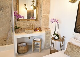 Shower, rainfall showerhead, designer toiletries, hair dryer