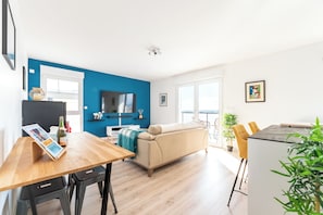 Panoramic Penthouse, 3 Bedrooms, Mobility Accessible, Pets Allowed | Living area | 55-inch Smart TV with cable channels, video-game console, Netflix - Rouen Seine View Apartment (Rouen)