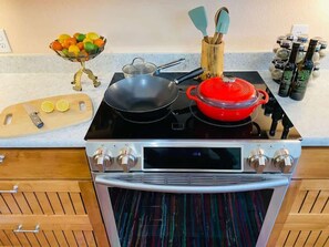 Fridge, stovetop, coffee/tea maker, cookware/dishes/utensils