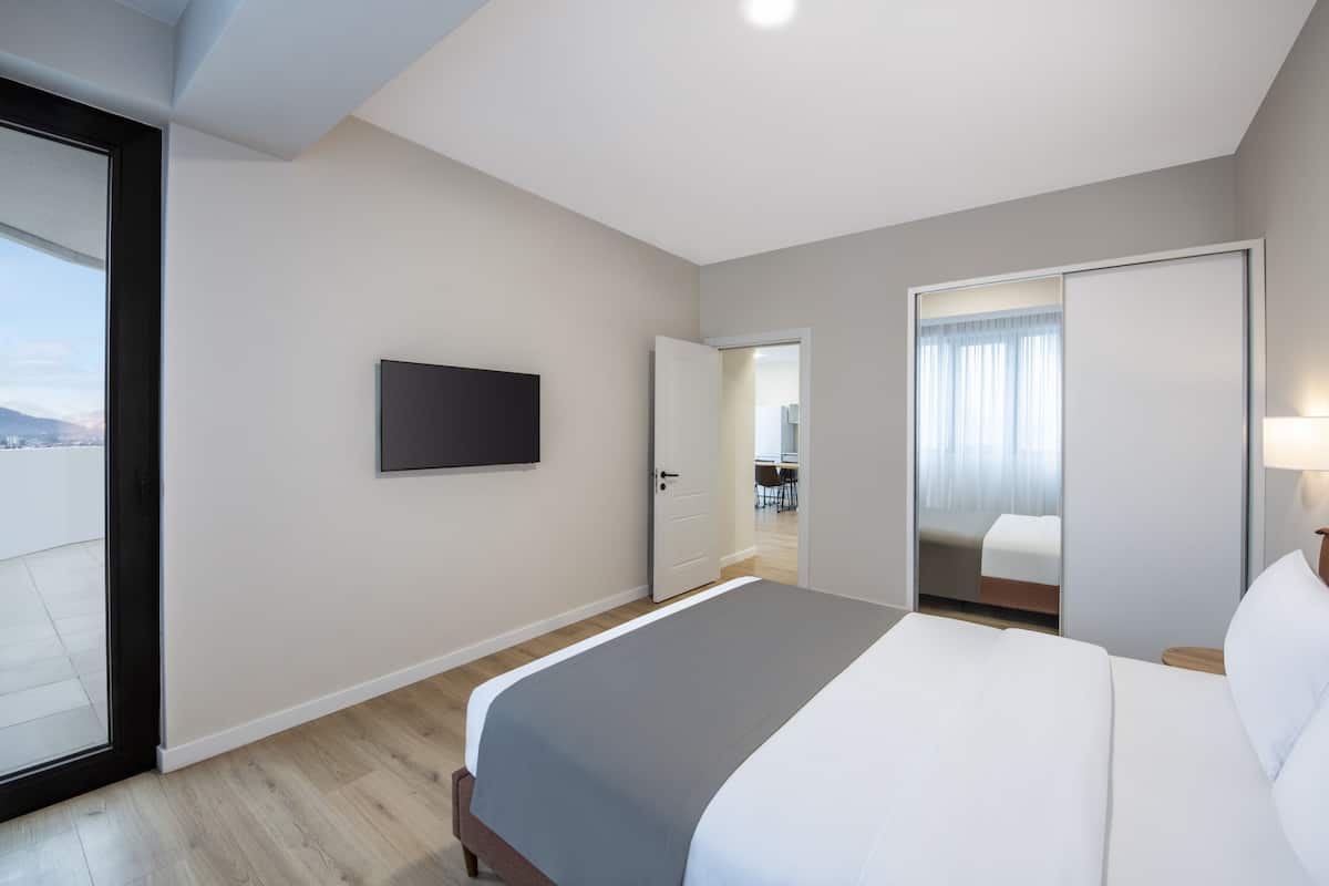 Suite, 2 Bedrooms | 1 bedroom, soundproofing, iron/ironing board, free WiFi