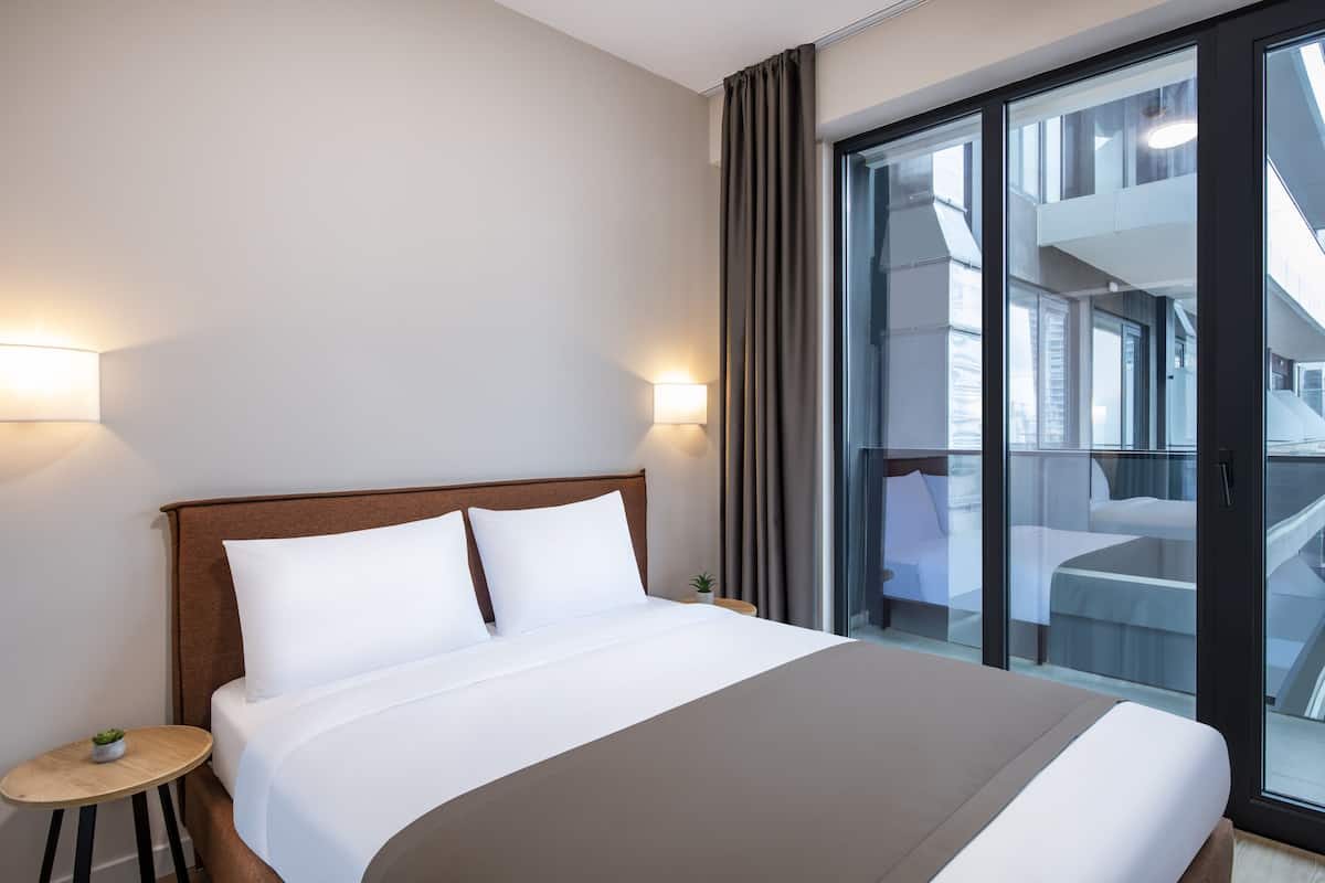Suite, 1 Bedroom | 1 bedroom, soundproofing, iron/ironing board, free WiFi